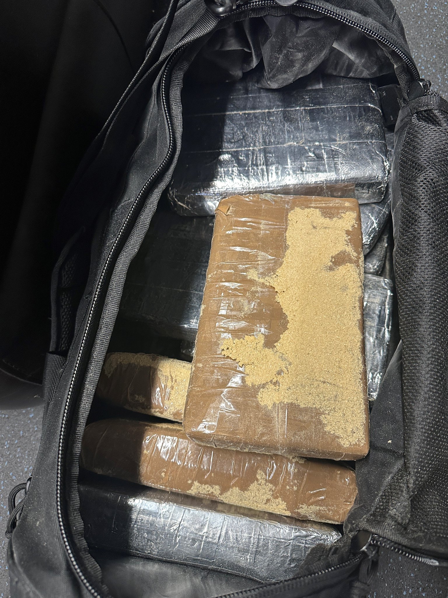 DEA agents, the NYPD and the SNP's Special Investigations Bureau took down a narcotics trafficking crew after 12 kilograms of cocaine were recovered at a Bushwick sports bar. 