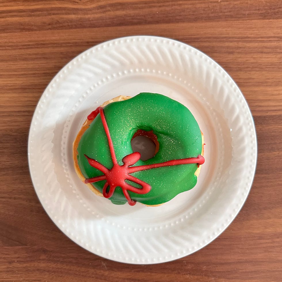 festively decorated donut on a plate