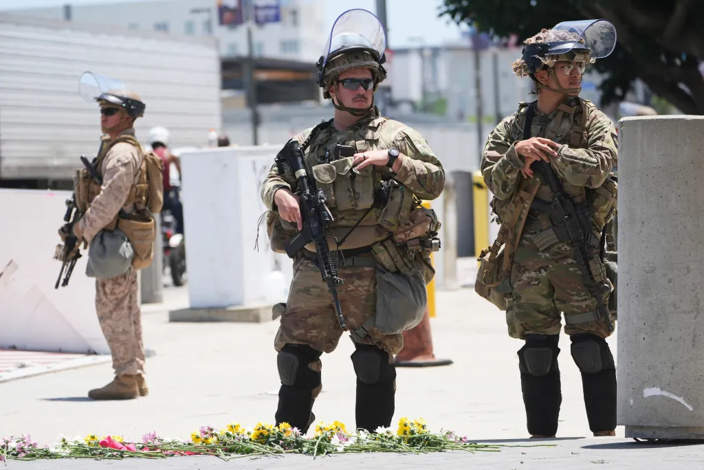 Members of the California National Guard and U.S. Marines guarding a federal building in Los Angeles.