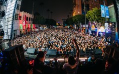 Mochakk plays on Hollywood Blvd. on Dec. 13, 2025.