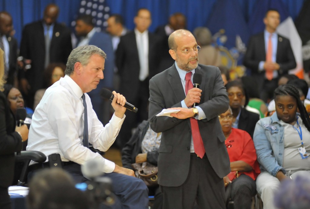 New York City Mayor Bill de Blasio and Steven Banks, Commissioner of New York City Human Resources Administration Dept. of Social Services, speaking at a town hall meeting.