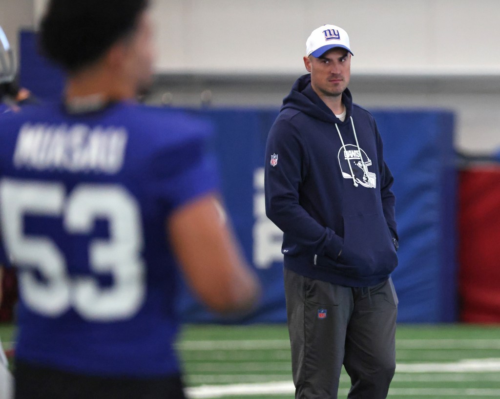 Mike Kafka observing practice at the New York Giants training facility.