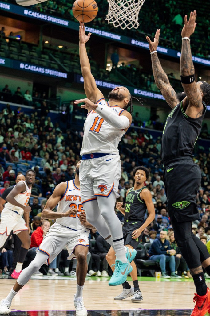 New York Knicks guard Jalen Brunson (11) drives to the basket against \New Orleans Pelicans guard/forward Saddiq Bey (41) during the first half at Smoothie King Center. 