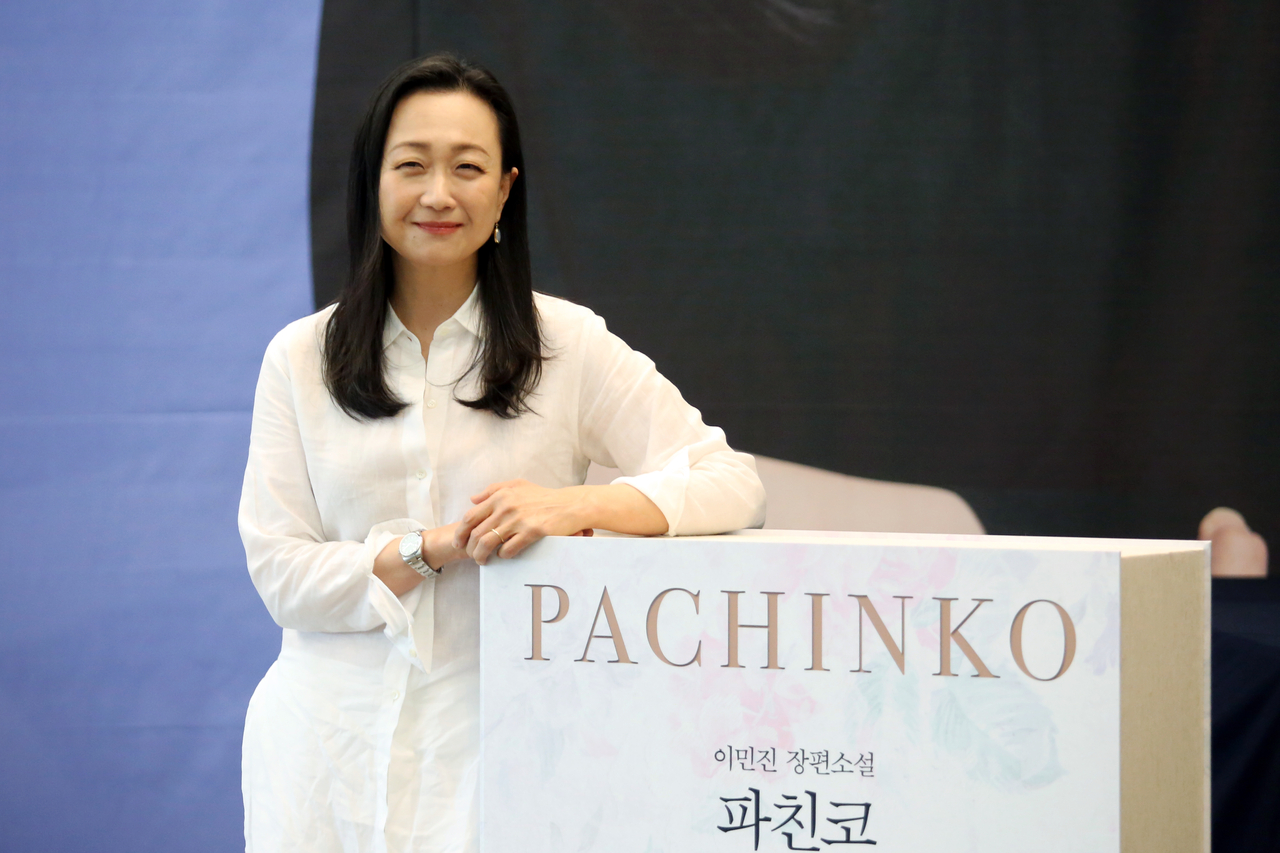 Min Jin Lee, author of the novel "Pachinko," poses for photos ahead of a press conference at the Korea Press Center in Seoul on Aug. 8, 2022. (Newsis)