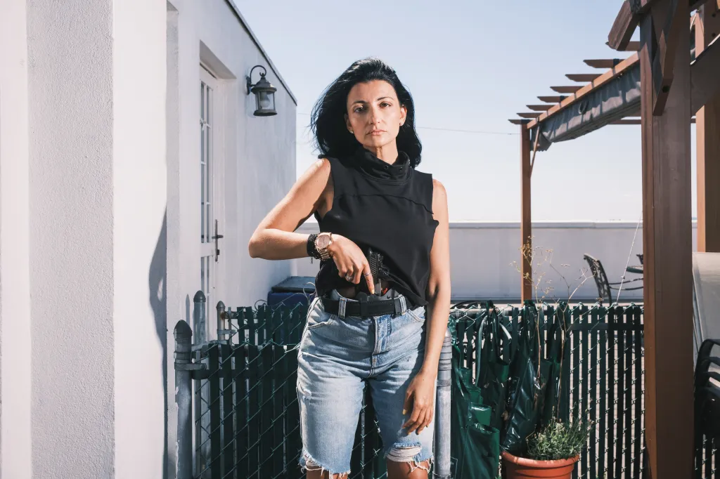 NYC City Councilwoman Inna Vernikov with a black Glock pistol tucked into her waistband.