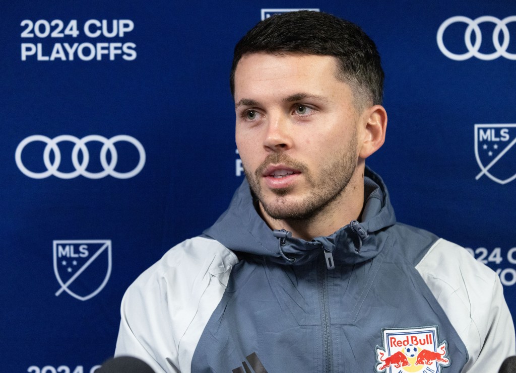 Red Bull's Lewis Morgan talks after practice.