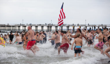 Thousands of people rush into the waters off Coney Island to welcome in the new year.Photo by Paul Frangipane/Brooklyn Eagle