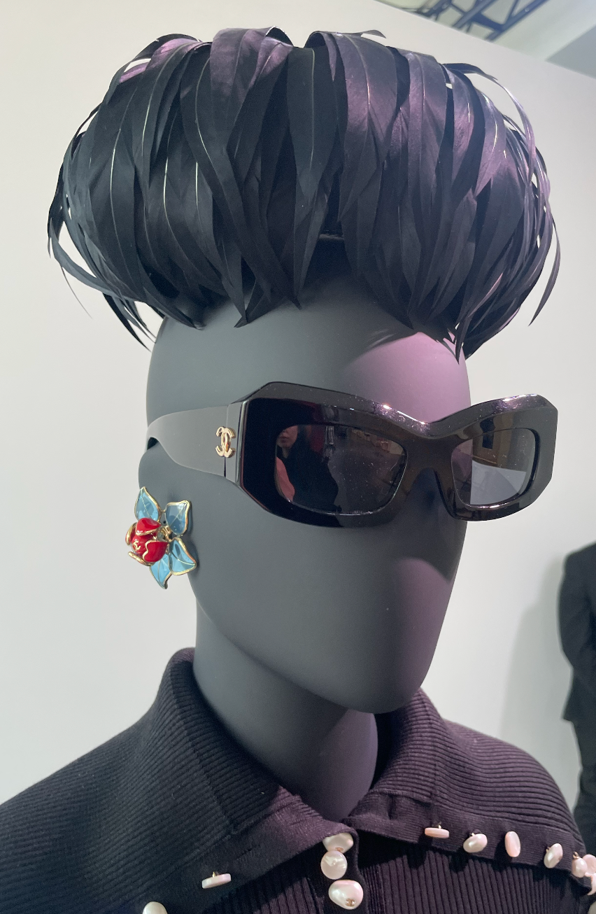 chanwel feather hat and earrings