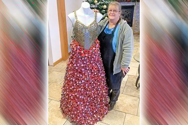 New York artist makes dress entirely from shotgun shells for holidays