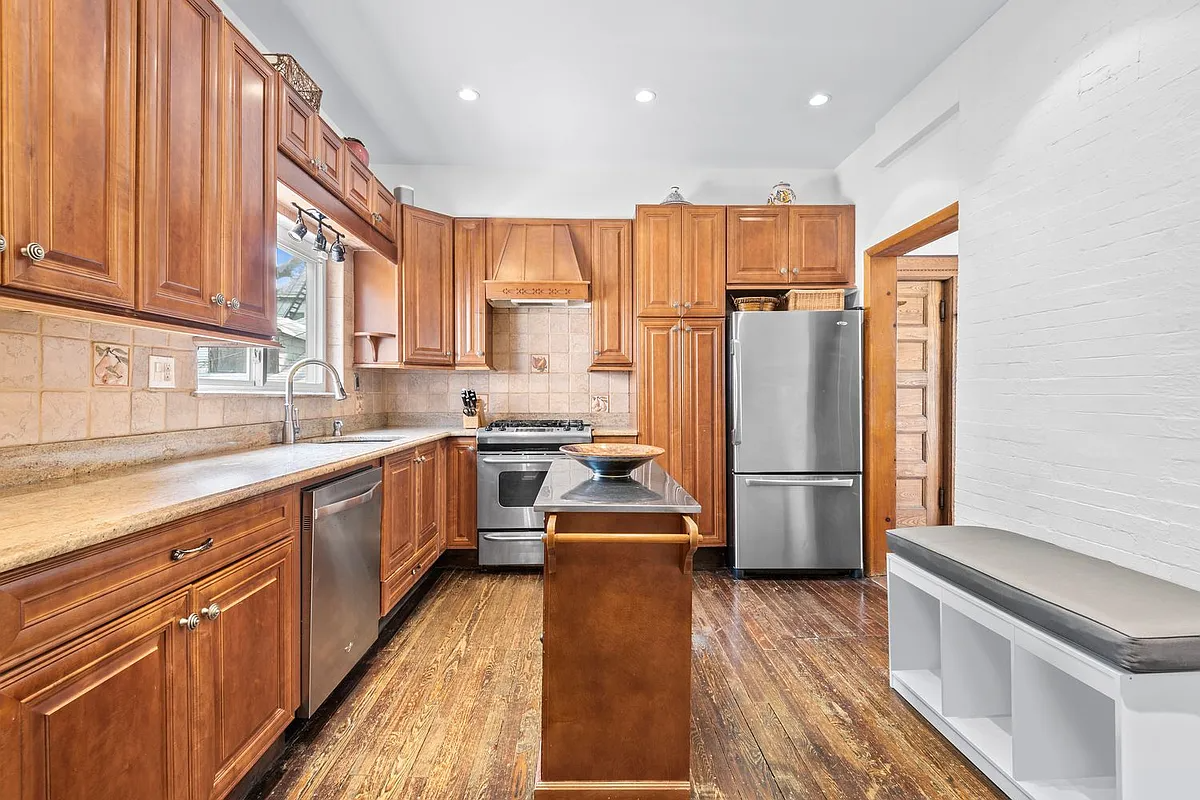 kitchen with wood cabinets, recessed lighting