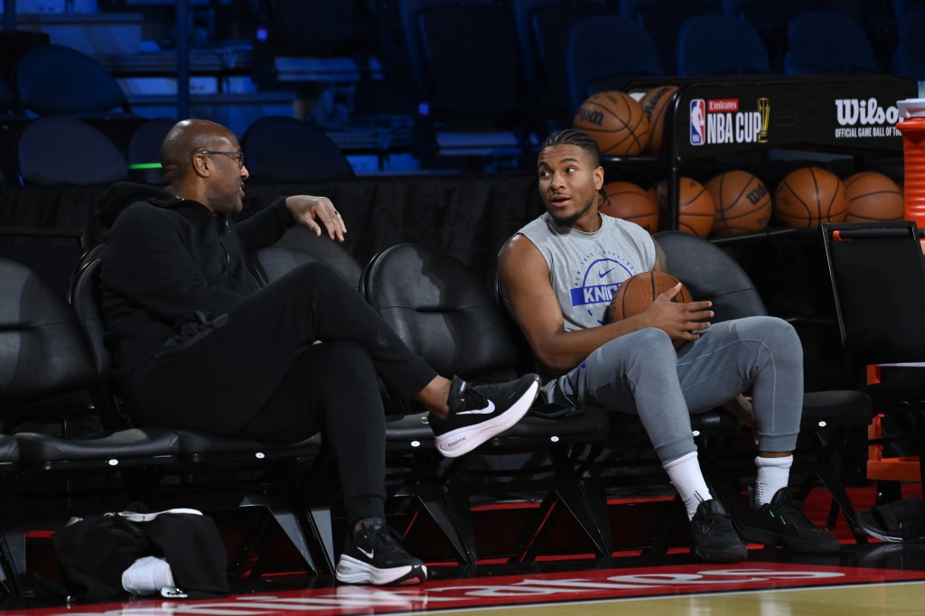 Head Coach Mike Brown and Miles McBride #2 of the New York Knicks talk during the 2025 Emirates NBA Cup Practice and Media Availability.