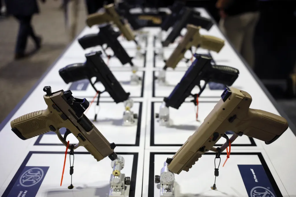 Fabrique Nationale Herstal (FNH) weapons displayed at the Special Operations Forces Industry Conference (SOFIC).