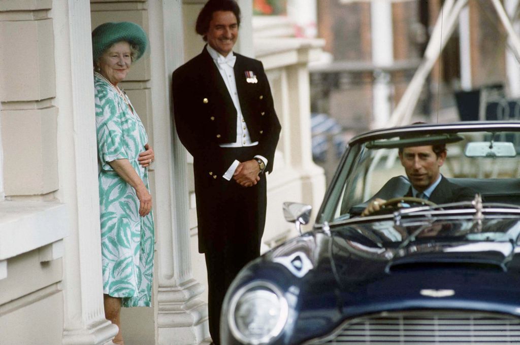 king charles in aston martin