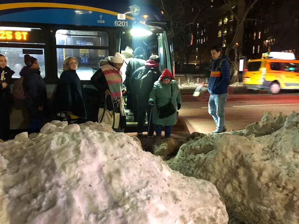Many of the bus stops leave some riders to navigate narrow and slippery paths. Jenn Bain