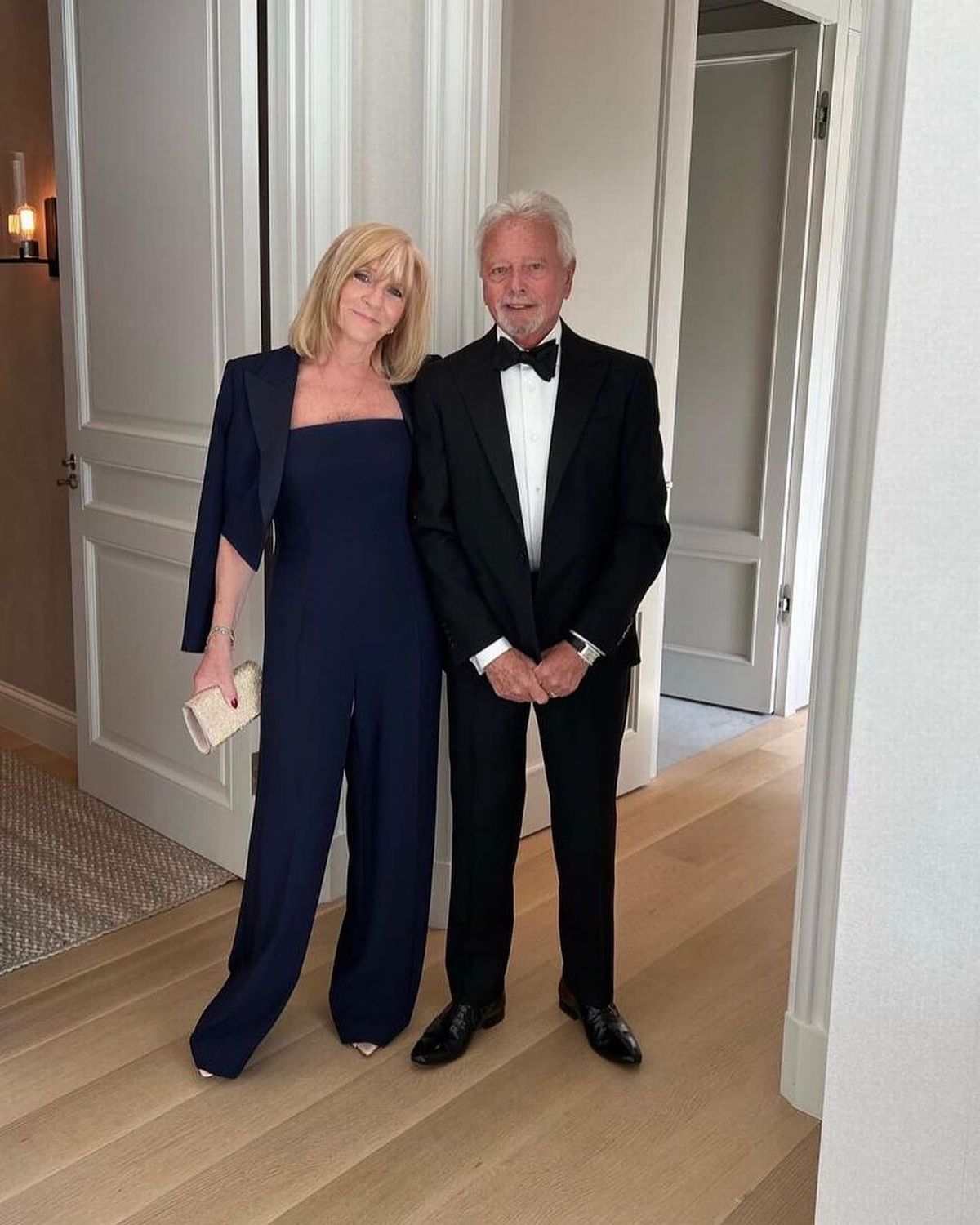  Jackie Adams hanging a Christmas stocking for Brooklyn on the mantlepiece of her fireplace