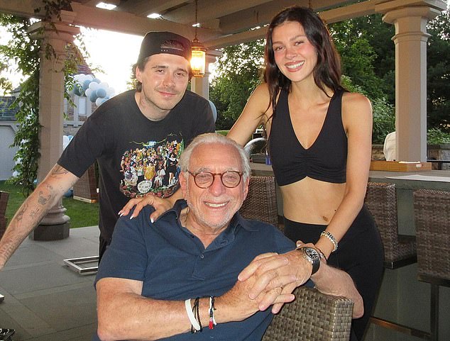 With his parents reportedly out of the picture, Brooklyn (left) is likely turning to his billionaire father-in-law, Nelson Peltz (center), one of the most influential figures in global business