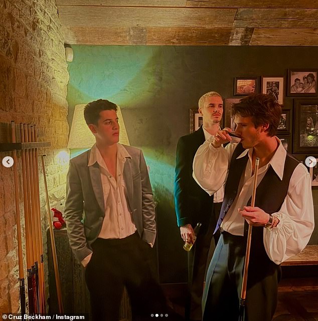 The budding musician shared a snap of himself enjoying a drink with Romeo, 23, as they played snooker