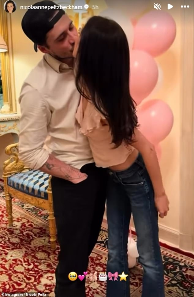 Balloons, cupcakes and Oreos were also available for the dozens of guests in attendance - among them, of course, Brooklyn, 26, who shared a smooch with his wife