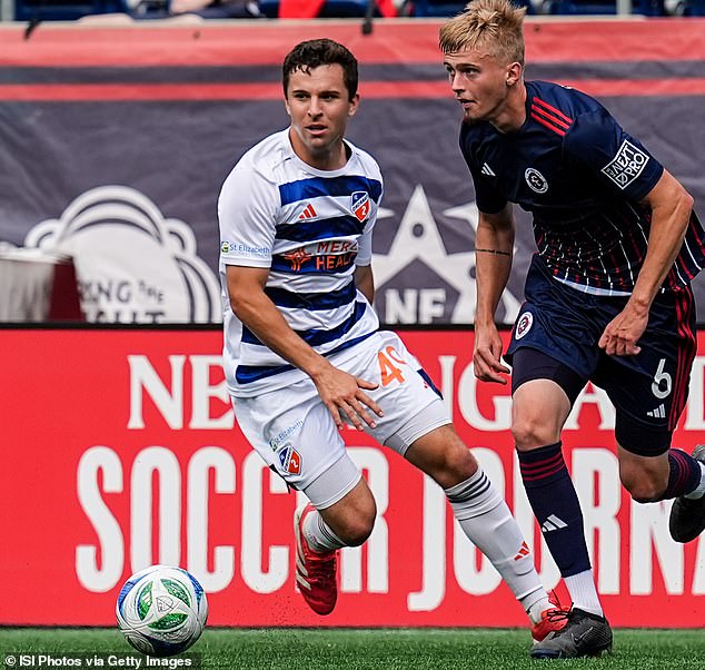 Brooklyn FC has signed midfielder Peter Mangione (white kit) to their roster