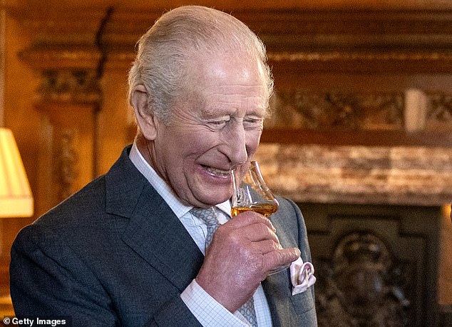 King Charles tastes whisky from Ian MacLeod Distillers during a reception to mark the Scotland Investment Forum