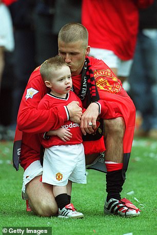 David Beckham brought Brooklyn onto the pitch after winning the Premier League title
