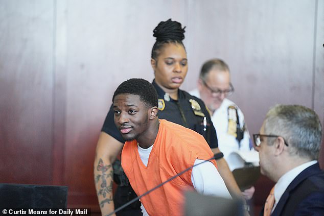 Green, wearing an orange prison jumpsuit, was pictured entering court for his indictment