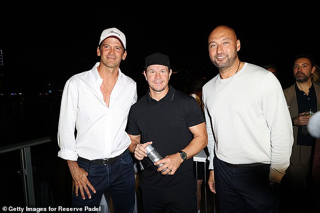 The 14-time All-Star poses with Boich and actor Mark Wahlberg ahead of the padel tournament