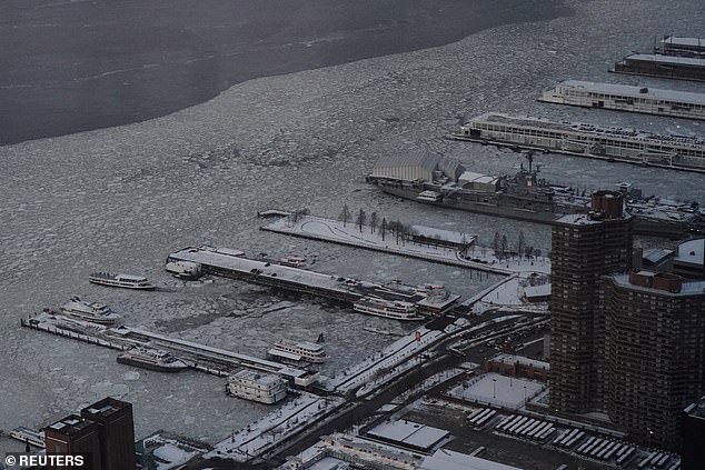 Ice floes around ferry piers in the Hudson between New Jersey and New York City