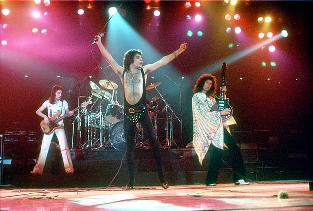 Roger Taylor, Freddie Mercury, and Sir Brian pictured performing in California in 1977