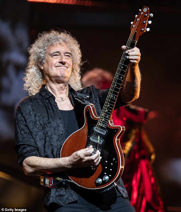 Queen will never tour in the US again because it is 'too dangerous', says the band's lead guitarist Brian May (pictured in 2023)