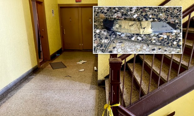 An NYPD cop shot a man to death who, during a fight with his father, charged at police with a boxcutter (inset) in a Far Rockaway apartment building early Sunday.