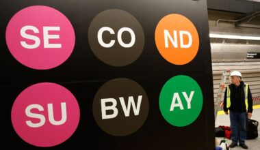 Workers put the finishing touches on the new 86th Street subway station in New York on Thursday, Dec. 22, 2016. (AP Photo/Seth Wenig)