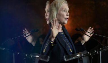 Sen. Kirsten Gillibrand, D-N.Y, is reflected on a television screen as she speaks in New York, Tuesday, Nov. 5, 2024. (AP Photo/Seth Wenig)