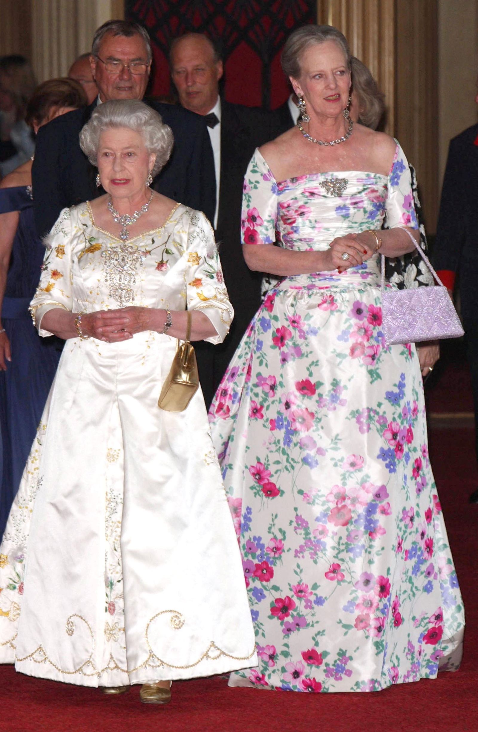 Image may contain Elizabeth II Henrik Prince Consort of Denmark Harald V of Norway Person Accessories Bag and Handbag