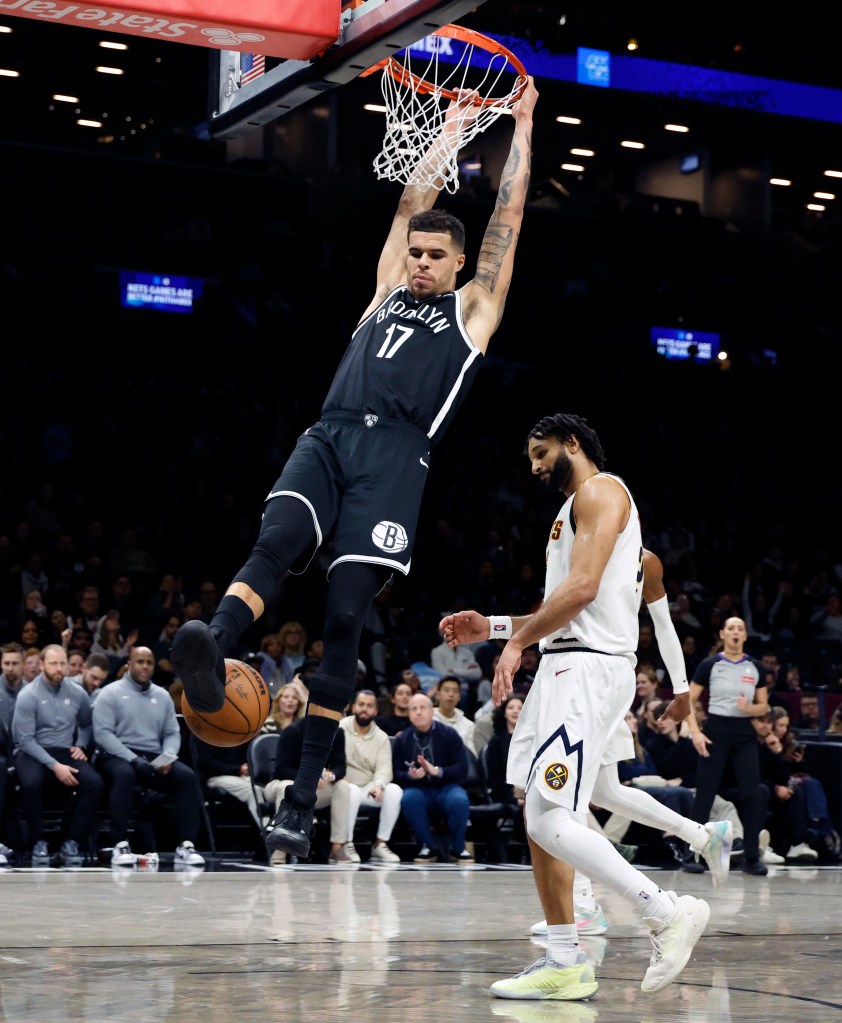 Michael Porter Jr. #17 of the Brooklyn Nets slams the ball in the second half. The Brooklyn Nets defeat the Denver Nuggets at the Barclays Center in Brooklyn, New York, Sunday, January 04, 2026. 