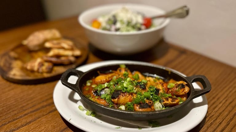 Gigantes beans and marouli (romaine) salad at Skara Taverna in...