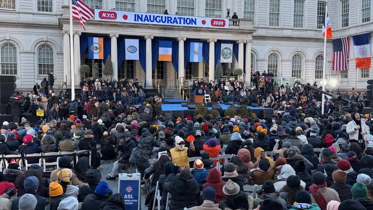 The crowd packs City Hall Plaza for the inauguration on...