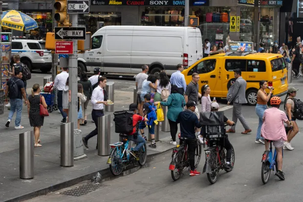 Pedestrians make their way through New York City. (Shutterstock) 