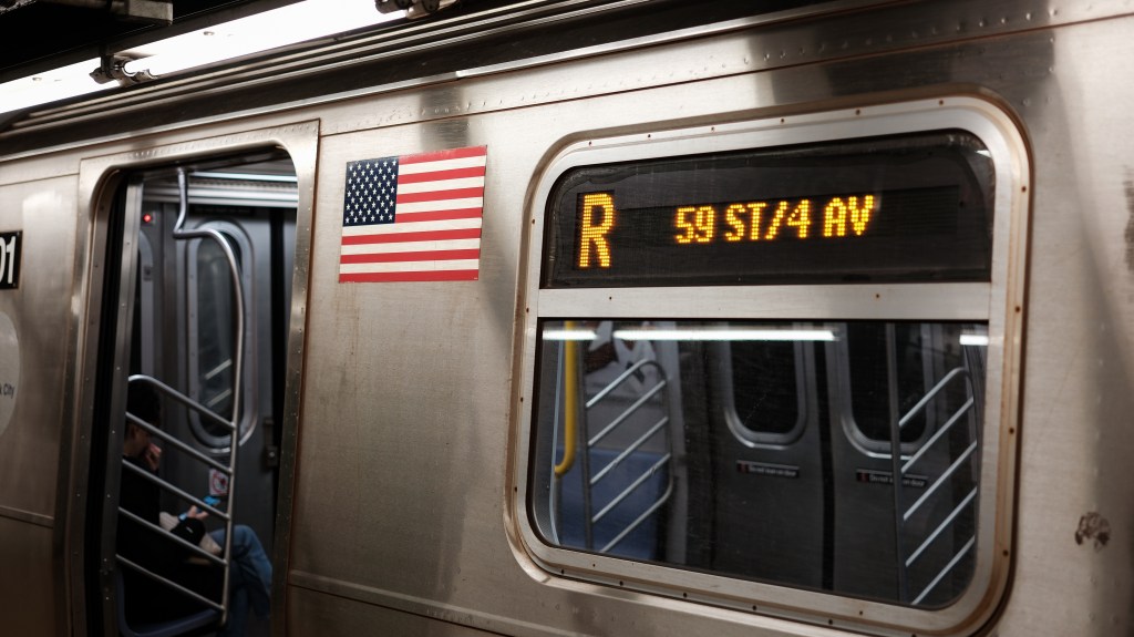 Man struck by train in Queens as good Samaritans pull him from tracks