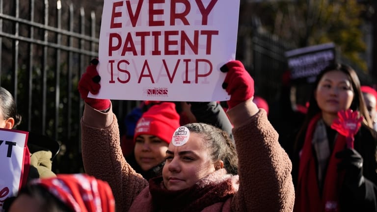 Nurses strike in front of Montefiore Hospital in the Bronx...