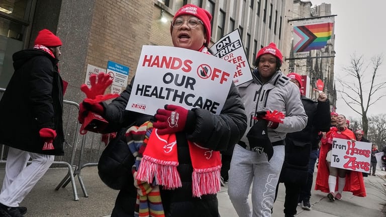 Striking nurses demonstrate outside Mt. Sinai Morningside Hospital, in New...