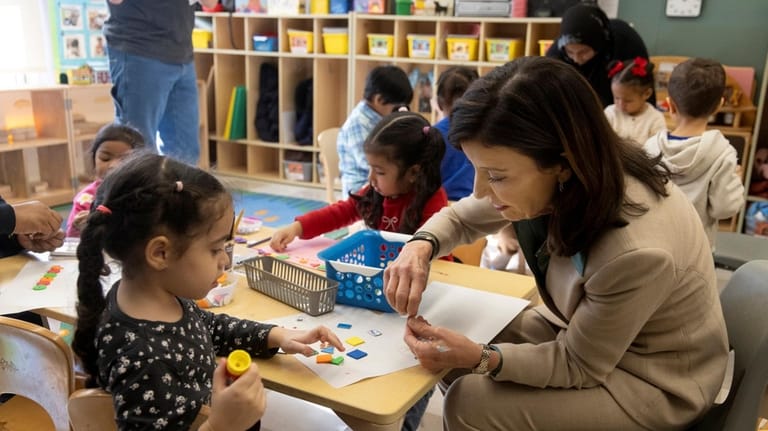 Gov. Kathy Hochul sits in on a class at the...