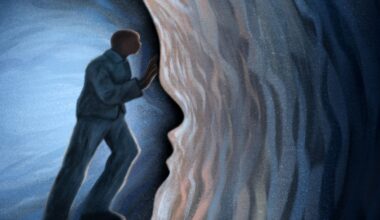 An illustration shows a Black man in a dark blue prison uniform pushing against a wall that is shaped like a face. There are brown, white and blue waves on the right side of the wall.