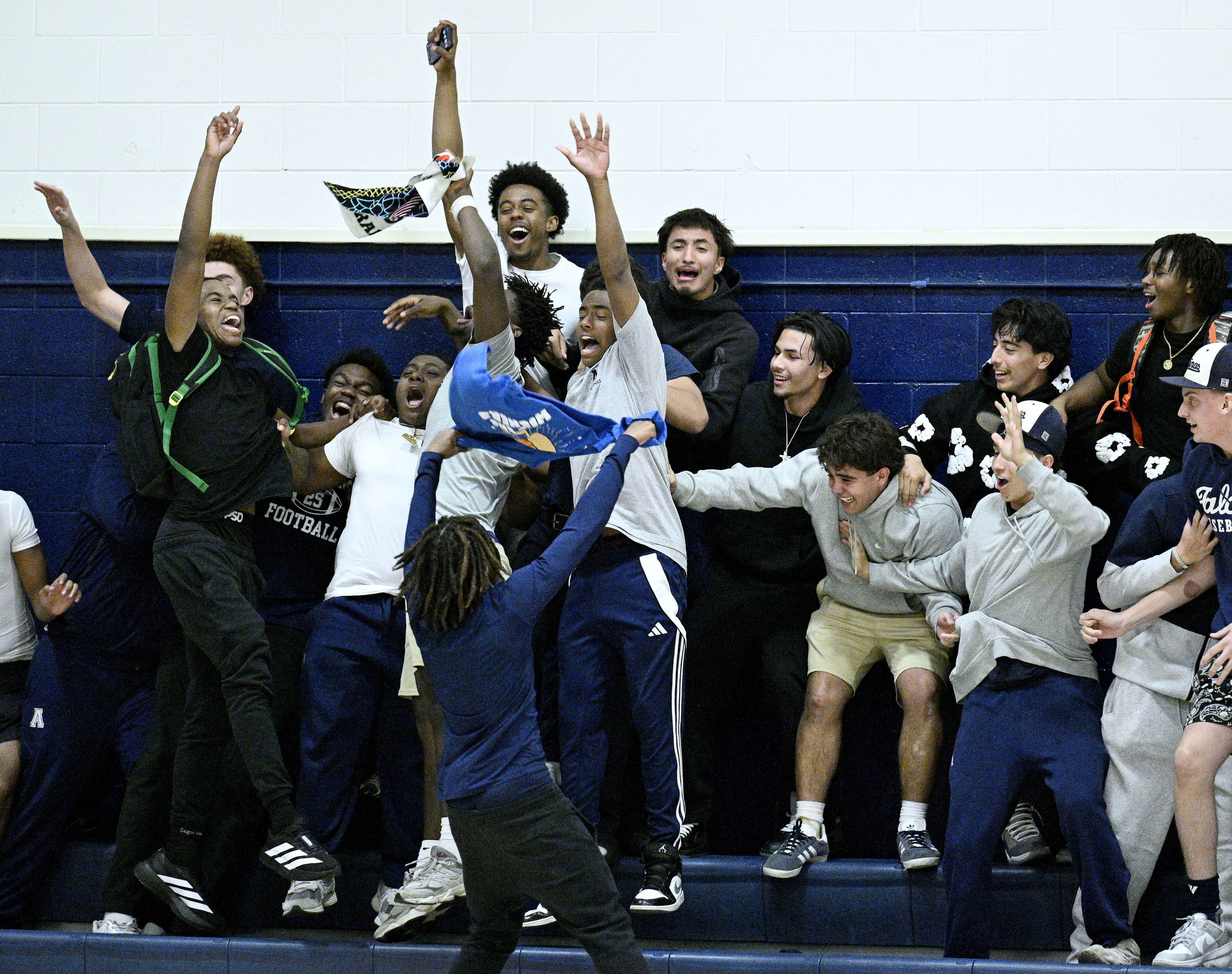Aquinas student section cheers for the Falcons against Arrowhead Christian...