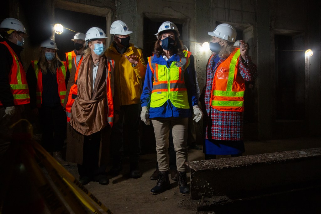 Gov. Kathy Hochul speaks to reporters in a Second Avenue Subway tunnel,