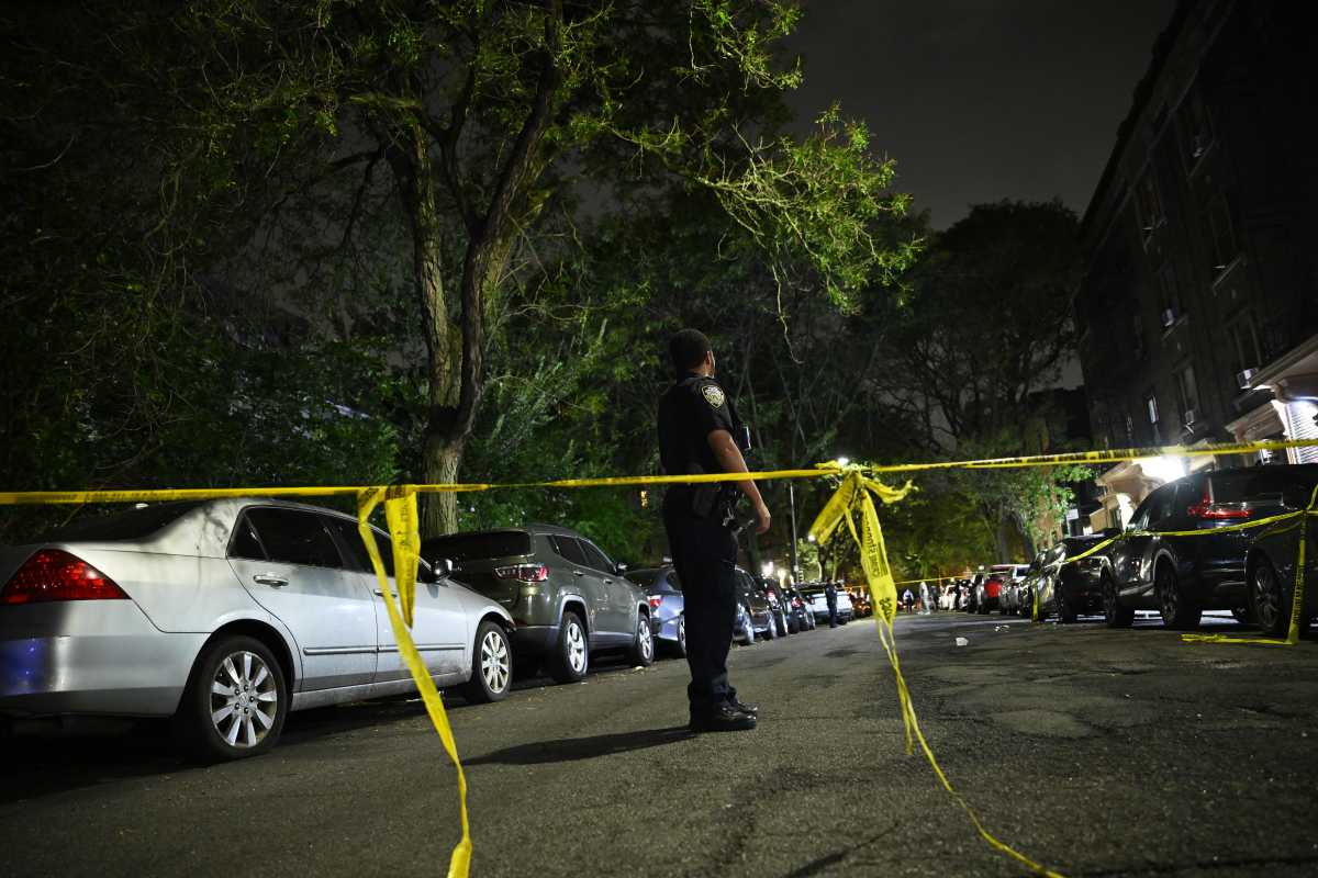 police officer near crime scene tape in Manhattan