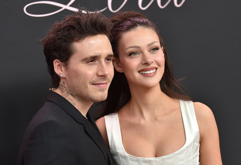 Brooklyn Beckham and Nicola Peltz smiling