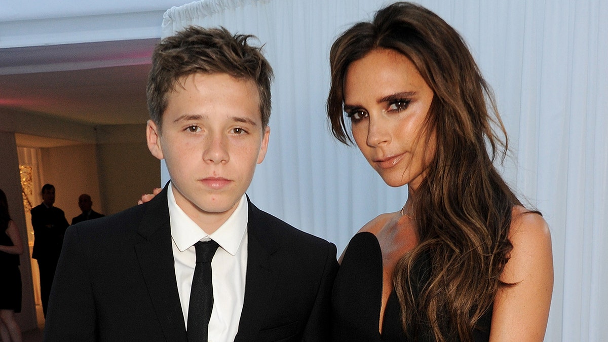 Brooklyn Beckham and Victoria Beckham at the Glamour Women of the year Awards in London in June 2013.
