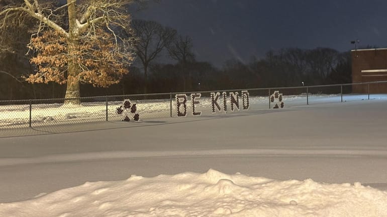 Snow piles up at Silas Wood Sixth Grade Center in...