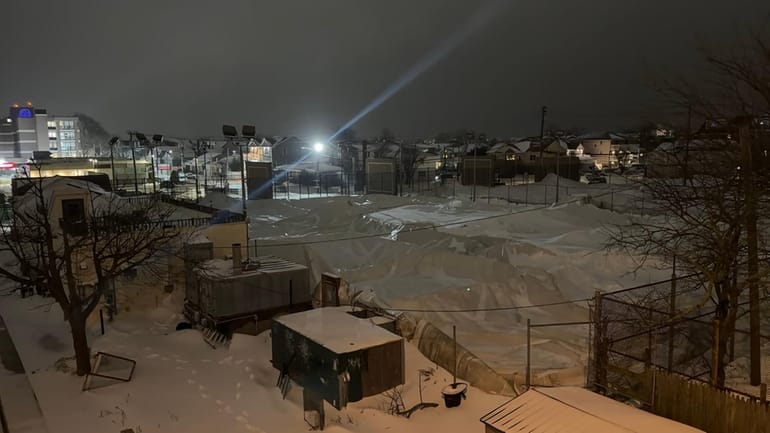 The Long Beach Tennis Center's bubble sits deflated on Sunday...
